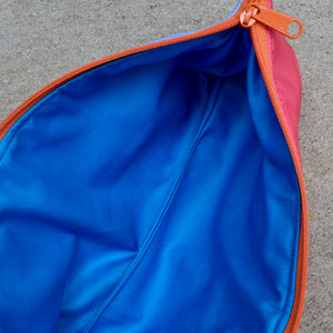 OBLONG zippered pouch: periwinkle/red/orange/pink (18) EACH SIDE IS DIFFERENT!