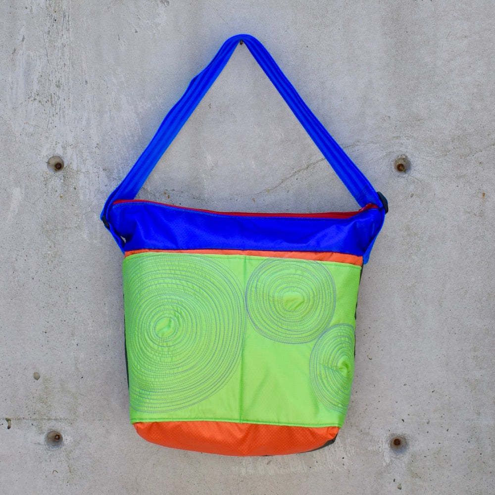 large zippered bag with outer pockets: lime/orange/purple (23-25)