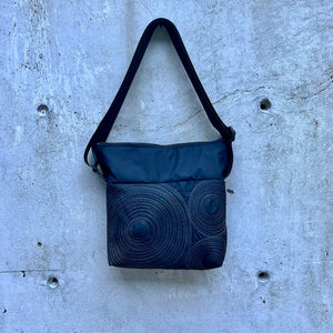 small zippered bag: black with grey stitching