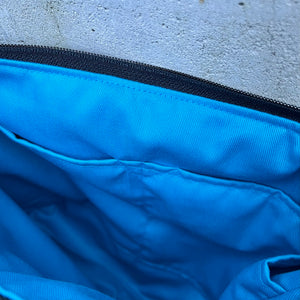 small zippered bag: black with grey stitching