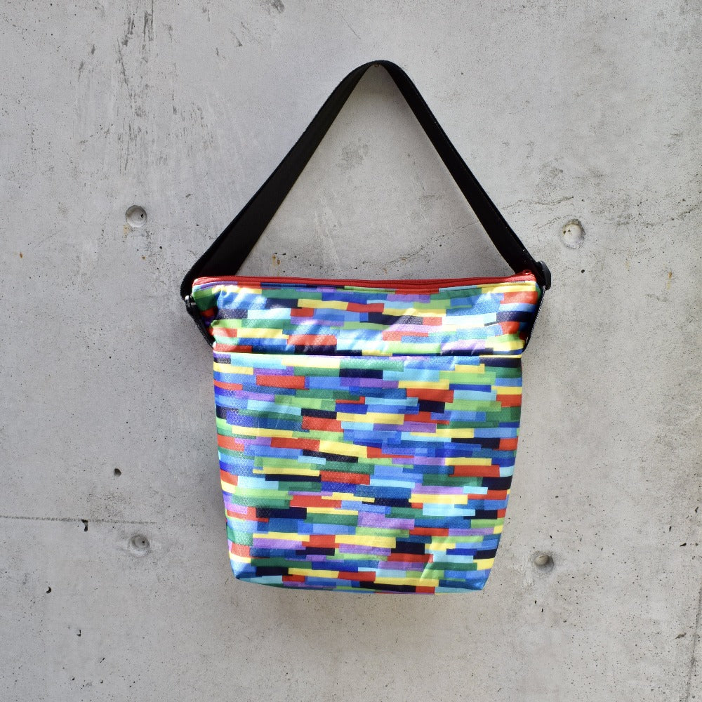 large zippered bag: multi-coloured collage