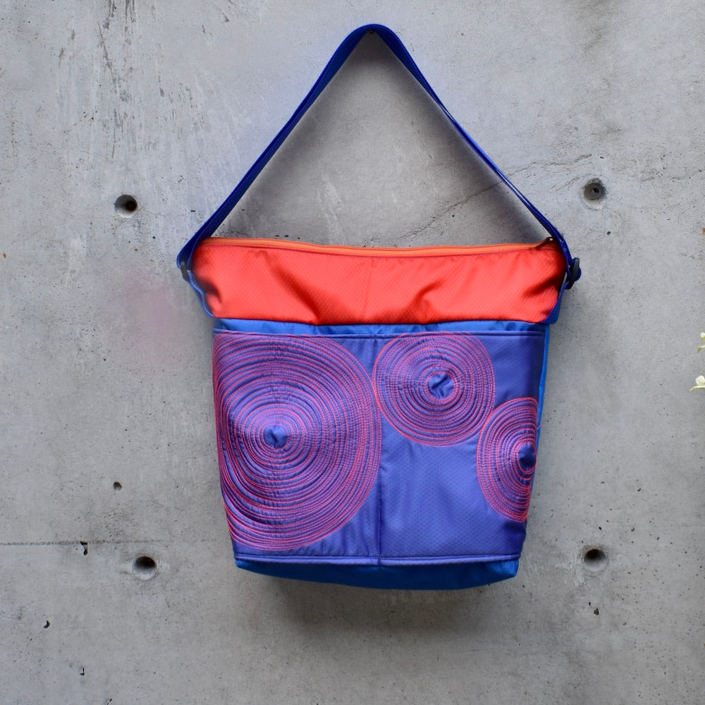 large zippered bag with outer pockets: purple/blue/orange (22-3)