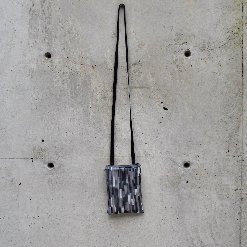 neck pouches: grey collage