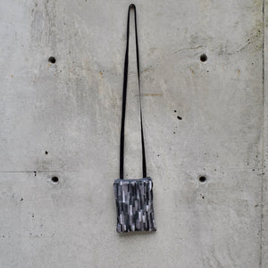 neck pouches: grey collage