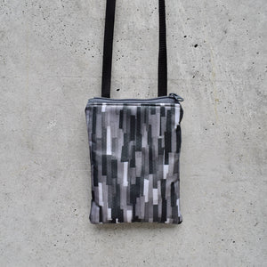 neck pouches: grey collage