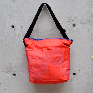 large zippered bag with outer pockets: reddy/orange with mauve